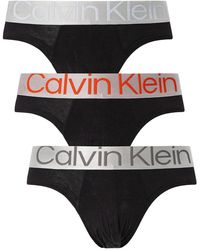 Calvin Klein - Slip da Uomo in Confezione tripack Cotone Elasticizzato NB3129-Gtb - Lyst