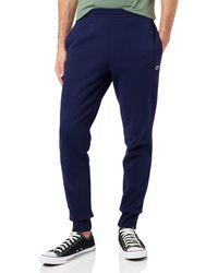 Pantaloni In Techno Tessuto di Lacoste in Blu per Uomo abbigliamento da palestra e sportivo da Pantaloni da jogging Uomo Abbigliamento da Activewear 4% di sconto 