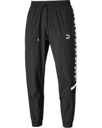 PUMA - Joggings XTG Woven - Lyst