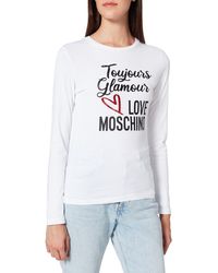 Love Moschino - Fitted Long Sleeve T-Shirt in 30/1 Cotton Jersey. Customized with Glitter Print of Seasonal Slogan And Logo - Lyst