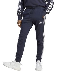 adidas - Size Essentials French Terry Cuffed 3-Stripes Pants - Lyst