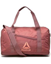bolsa reebok dorados