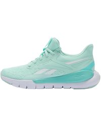 Reebok - Flex Trainer Sneaker - Lyst