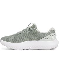 Under Armour - Ua W Charged Surge 4 Hardloopschoenen Voor - Lyst