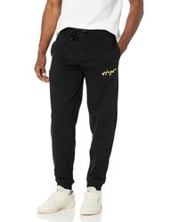 HUGO - Jogginghose aus Baumwollmischung mit Script-Logo Lässige Hose - Lyst