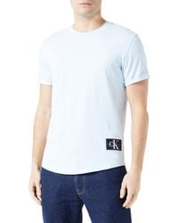Calvin Klein - Badge Turn Up Sleeve S/s Knit Tops Blue - Lyst