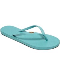 white roxy flip flops
