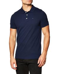 Polos Tommy Hilfiger de hombre | en línea, hasta el 71 de descuento | Lyst