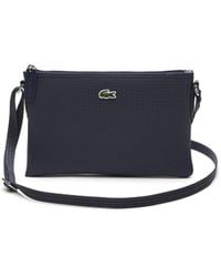 Lacoste - Sac Crossover Toile PVC Femme - Lyst