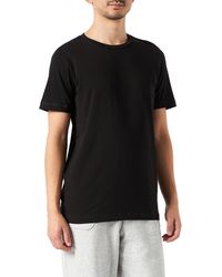 CARE OF by PUMA Active T-shirt - Black
