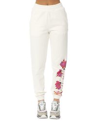 Guess - Pantalone donna Corine floral logo jogger bianco ES23GU55 V3RB14K68I3 M - Lyst