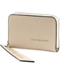 Calvin Klein - CKJ Sculpted Med Zip Around Tag Wallet Ballet - Lyst