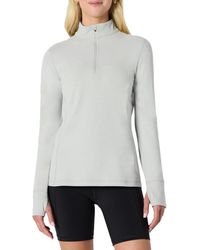 Amazon Essentials - Camiseta Deportiva Suave de Alto Rendimiento de ga Larga con Cremallera de un Cuarto Mujer - Lyst