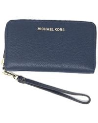 Michael Kors - Jet Set Travel Large Flat Multifunction Phone Case Wristlet Pebble Leather - Lyst