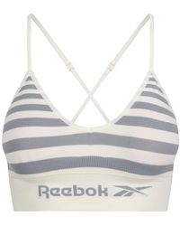 Reebok - Seamless Bra in Grau und Weiß herausnehmbaren Pads | Crop-Top für Fitness mit geringer Belastung | Bequem und dehnbar mit - Lyst