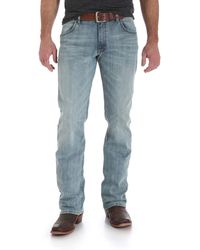Wrangler Bootcut jeans for Men - Up to 34% off at Lyst.co.uk