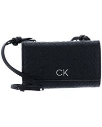 Calvin Klein - Re-lock Mini Tas Emb Mono - Lyst