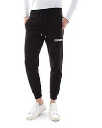 pantaloni rossi converse