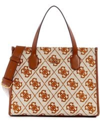 Guess - Silvana 2 Compartment Tote Saddle Logo - Lyst