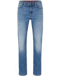 HUGO - 708 Blaue Slim-Fit Jeans aus bequemem Stretch-Denim Türkis 35/32 - Lyst