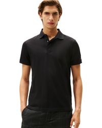 Tommy Hilfiger - Poloshirts Kurzarm Casual Regular Fit mit versteckter Knopfleiste Design - Lyst