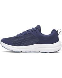 Under Armour - Baskets Charged Assert 10 pour femme, - Lyst