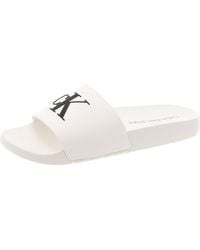 Calvin Klein - Arin 2 Slip On Open Toe Pool Slides - Lyst
