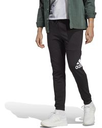 adidas - Essentials Single Jersey Tapered Badge of Sport Pants Pantalones - Lyst