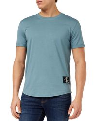 Calvin Klein - Jeans T-Shirt Kurzarm Badge Turn Up Sleeve Rundhalsausschnitt - Lyst