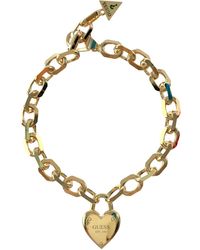 Guess - All You Need Is Love Heart Lock Chain Bracelet S Geel Goud - Lyst