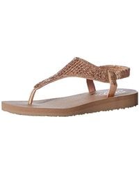 skechers slippers gold