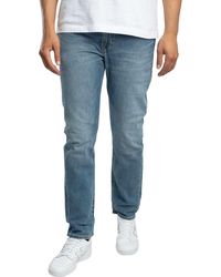 Levi's - 502 Taper Jeans - Lyst