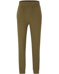 HUGO - Labelled Pants Jogginghose aus elastischem Baumwoll-Jersey mit rotem Logo Hellgrün XXL - Lyst