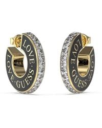Guess - Orecchini da donna di della collezione Love . Gioiello in acciaio placcato di colore oro giallo e nero. La referenza è: - Lyst