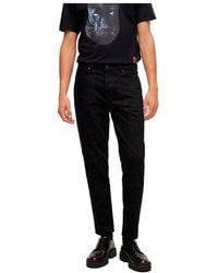 HUGO - 634 Jeans_Trousers - Lyst