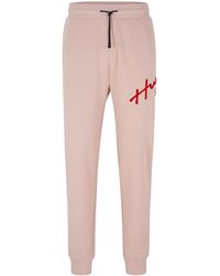 HUGO - Cotton-terry Tracksuit Bottoms With Handwritten Logo Embroidery - Lyst