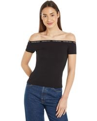 Calvin Klein - Jeans Elastische Bardot-top Met Logo Voor Overig Gebreid - Lyst