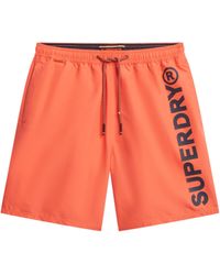 Superdry - 43,2 cm Sport-Badeshorts mit Grafik Leuchtend Korallrot M - Lyst