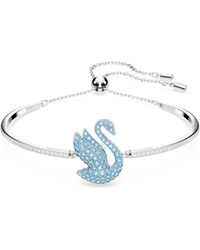 Swarovski - Bracelet-Jonc Iconic Swan Parsemé de Pierres Incolores et D'Un Cygne Au Centre - Lyst