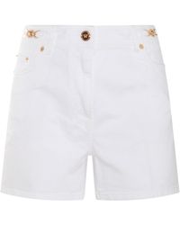 Versace - Cotton Denim Shorts - Lyst
