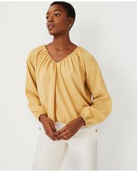 white bubble hem blouse