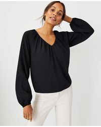 white bubble hem blouse