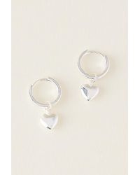Enamel Copenhagen - Amore Huggie Hoop Earrings - Lyst