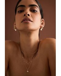 Enamel Copenhagen - Pearl Huggie Hoop Earrings - Lyst