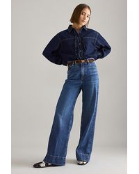FRAME - The Slice Flare Jeans - Lyst