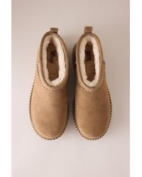 UGG - Stitch Classic Ultra Mini Boot - Lyst