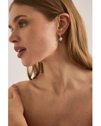 Rachel Jackson - Sterling Evolve Cone Huggie Hoop Earrings - Lyst