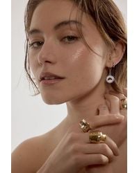 By Anthropologie - Ceramic Croissant Huggie Hoop Earrings - Lyst