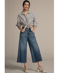 Pilcro - The Adi Mid-Rise Frayed Relaxed Flare Jeans By Cropped Edition - Lyst