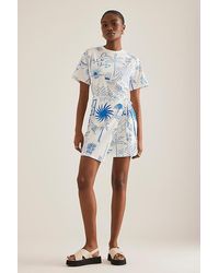 Never Fully Dressed - Palma Isla Mini Wrap Dress - Lyst